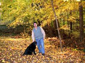 Jimmy and Hattie in the leaves.   ©Susan 
                                Shie 2005.