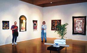 Sara Lechner and Jane Beckwith view quilts  Suzanne Fisher, Cyd Engel, Bridget O'Connell, Linda Dolack, and Susan McMillen 1999.