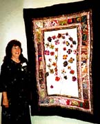 Susan McMillen with her quilt.