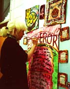 Me, painting on our Dishtowel quilt.