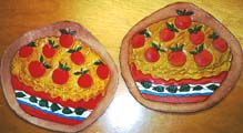 Jimmy's leather versions of the pie on the dishtowel! ©James Acord 1999.