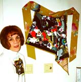 Leslie Gelber and one of her own art aprons.