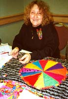 Francie Gross and her astrology quilt.