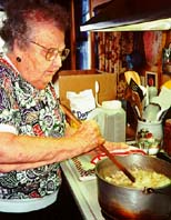 Aunt Nellie making peanut brittle.