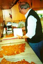 Uncle Lester packing peanut brittle.