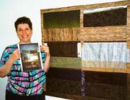 Robin Schwalb and her new quilt in progress.