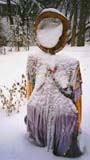 Dore, our last year's snowwoman, hangs tough in Feb snowstorm!