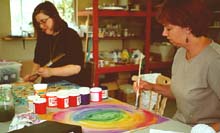 Julie and Vicki painting with Deka in Austin.©Susan Shie 2001.