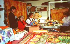 Jimmy machine sewing for campers in my studio.Susan Shie 2001.