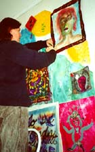 Evelyn practices sewing panels together.Susan Shie 2001.