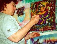 Jill works on sewing panels together at the wall.Susan Shie 2001.