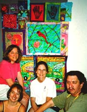 Jimmy and students with group quilt ©Susan Shie 2001.