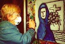 Susan airbrushing her blue nun.
