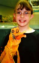 Chelsea Runkle and her bird puppet. ©Susan Shie 2001.