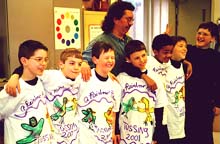 Core group boys and Jimmy, with tee shirts. ©Susan Shie 2001.