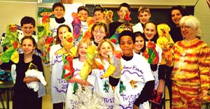 Core group with tee shirts and puppets.  James Acord 2001.