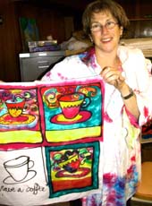 Vicki and her paintings.©Susan Shie 2002.