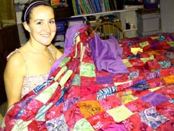 Danielle and her quilt.Susan Shie 2002.