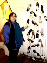 Maxine shows me the Shoe Show. ©Susan Shie 2002.