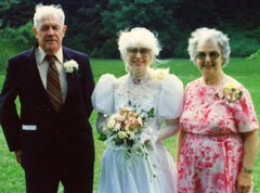 Dad, me, and Mom at my wedding to Jimmy. Susan Shie 2001.