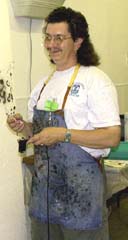 Jimmy teaching airbrush. Susan Shie 2002.