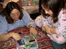 Michele and Linda look at art.Susan Shie 2003.