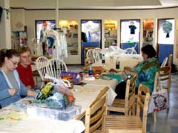 Friends Fabric Art staff working.Susan Shie 2003.