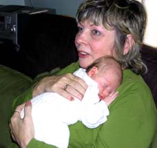 Eileen holding Eva. Susan Shie 2004.