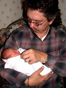 Eva and her Jimmy GrandDaddy.©Susan Shie 2004.