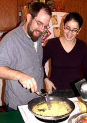 Greg and Jen making eggs.©Susan Shie 2004.