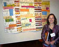 Angela Moll and her piece at QN.©Susan Shie 2005.
