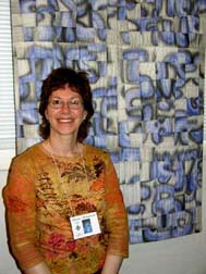 Sandy Shelenberger and her piece at QN.©Susan Shie 2005.